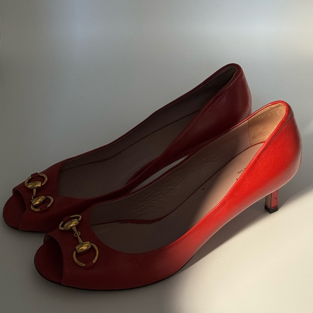 Gucci Red Heels with Gold Detailing